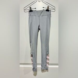 Girls light gray leggings. Pink striped cut out ankle detail.  7/8. Like new!